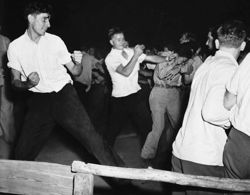 Fighting rages at picnic grove in Peekskill, N.Y., the night of Aug. 27, 1949, as veterans break up a scheduled concert by Black singer Paul Robeson. (AP Photo)