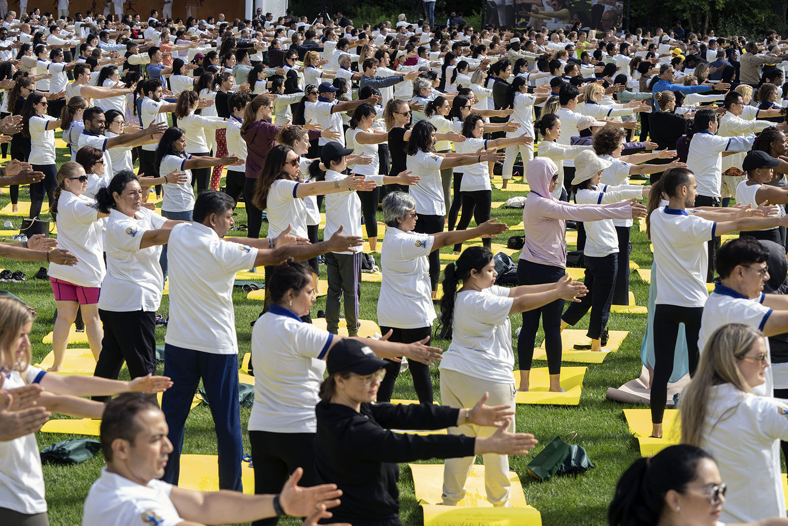 People practice yoga during an International Yoga Day event at United Nations headquarters in New York, Wednesday, June 21, 2023. India Prime Minister Narendra Modi joined diplomats and dignitaries at the United Nations for a morning session of yoga, praising it as “truly universal” and “a way of life.” (AP Photo/Jeenah Moon)