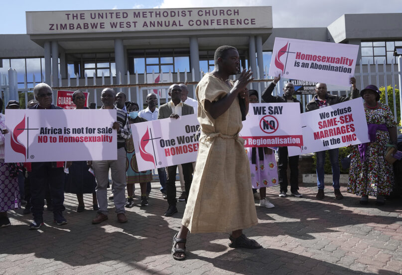 Members of the United Methodist Church in Zimbabwe hold placards while protesting at the church premises in Harare, Thursday, May 30, 2024. The protests, which denounced homosexuality and the departure of the church from the scriptures and doctrine, come barely a month after the United Methodist Church Worldwide General Conference held in North Carolina, US repealed their church's longstanding ban on LGBTQ clergy, removing a rule forbidding 