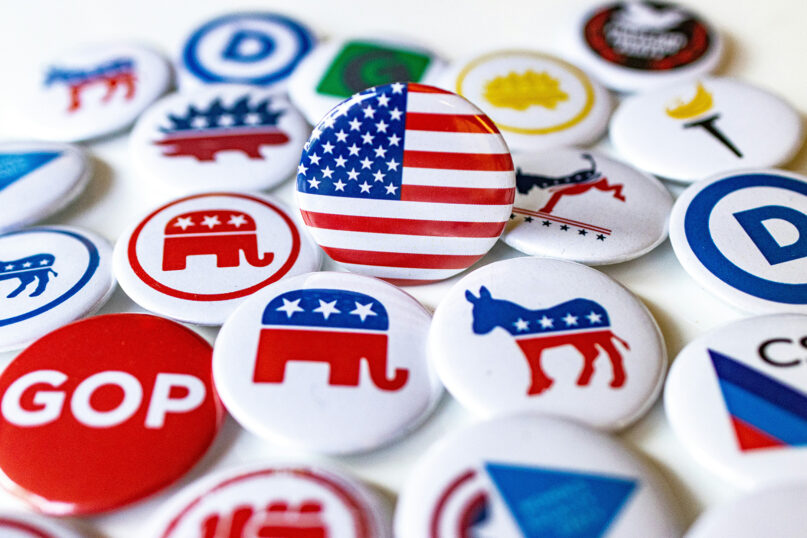 Political party buttons. (Photo by Marek Studzinski/Unsplash/Creative Commons)