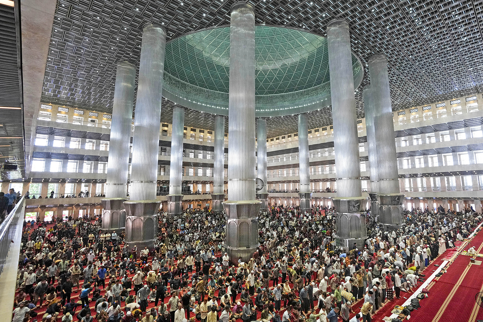 Muslim men attend Friday prayer at Istiqlal Mosque in Jakarta, Indonesia, Friday, Aug. 9, 2024, where Pope Francis is scheduled to hold an interfaith meeting on Sept. 5. (AP Photo/Tatan Syuflana)