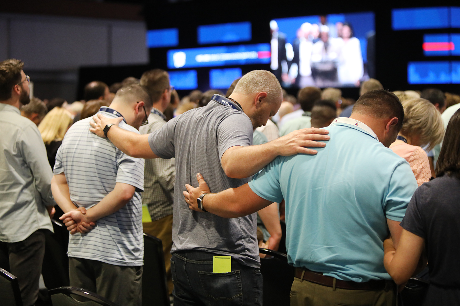 Messengers pray together during the annual meeting of the Southern Baptist Convention, Tuesday, June 15, 2021, at the Music City Center in Nashville. RNS photo by Kit Doyle