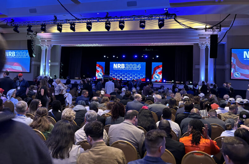 National Religious Broadcasters convention attendees await Republican presidential candidate former President Donald Trump, at the Gaylord Opryland Resort and Convention Center Thursday, Feb. 22, 2024, in Nashville, Tenn. (RNS photo/Bob Smietana)