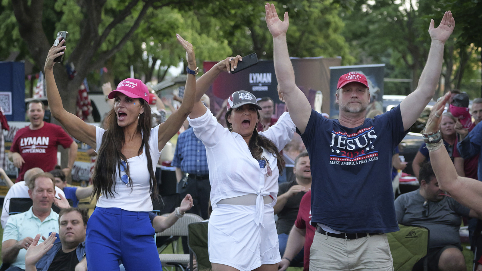 Republicans attend a rally for Trump-backed U.S. Senate candidate Trent Staggs and others on June 14, 2024, in Orem, Utah. Tuesday's primary election will determine if the state wants another moderate conservative like Romney or a farther-right candidate more willing to fall in line with former President Donald Trump. (AP Photo/Rick Bowmer)