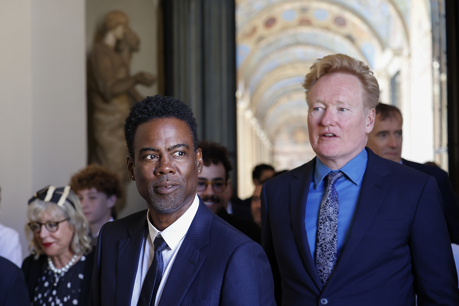 Chris Rock, left, and Conan O'Brien arrive for an audience with Pope Francis in the Clementine Hall at the Vatican, Friday, June 14, 2024. Pope Francis met with over 100 comedians from 15 countries aiming to establish a link between the Catholic Church and comic artists. (AP Photo/Riccardo De Luca)