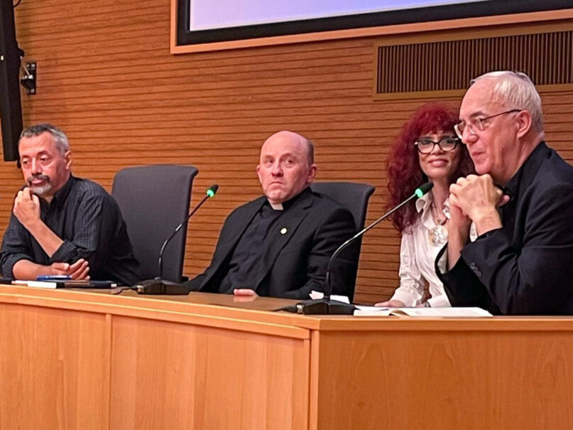 Fabio Scardigli, from left, the Rev. Gabriele Gionti, Ines Testoni and the Rev. Andrea Toniolo present essays about religion and science working together at the General Curia of the Jesuit Society in Rome, Friday, Sept. 6, 2024. (Photo courtesy Ines Testoni press office)