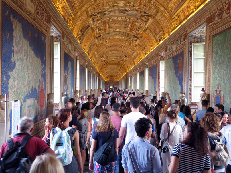 Throngs of tourists crowd the Gallery of Maps at the Vatican Museums in Rome. (RNS photo/Kit Doyle)