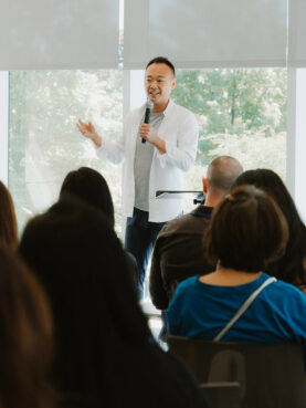 Pastor Aaron Bjerke addresses attendees at The Well's holistic wellness retreat at the Tata Innovation Center, Saturday, June 8, 2024, on Roosevelt Island in New York City. (Photo by AnnAnn Puttithanasorn)