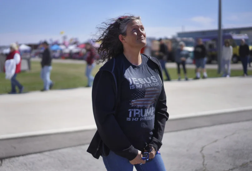 Sherrie Cotterman stands for a portrait while in line at a campaign rally for former president Donald Trump in Vandalia, Ohio, on Saturday, March 16, 2024. (AP Photo/Jessie Wardarski)