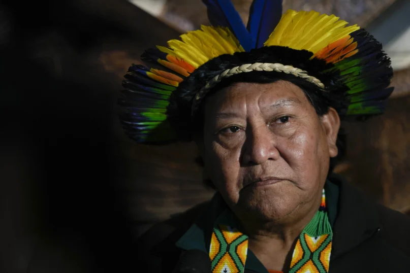 Davi Kopenawa, a Yanomami shaman, listens to reporters’ questions during a press conference after his meeting with Pope Francis at the Vatican, Wednesday, April 10, 2024. (AP Photo/Alessandra Tarantino)